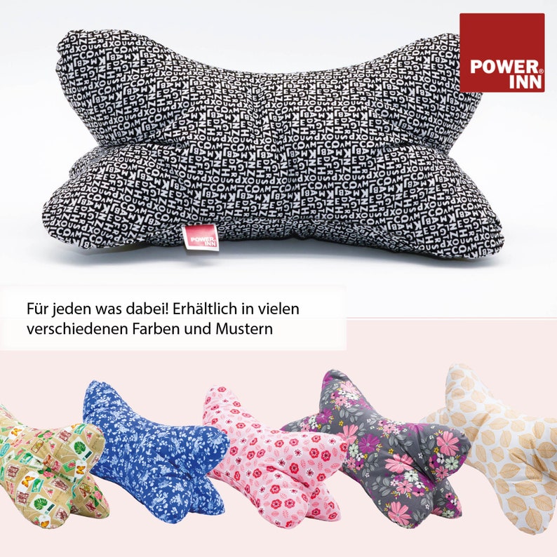 May include: A black and white patterned neck pillow with the text "POWER. INN" in red. The pillow is shaped like a bone and is available in a variety of colors and patterns.  The text "F&uuml;r jeden was dabei! Erh&auml;ltlich in vielen verschiedenen Farben und Mustern" is below the pillow.