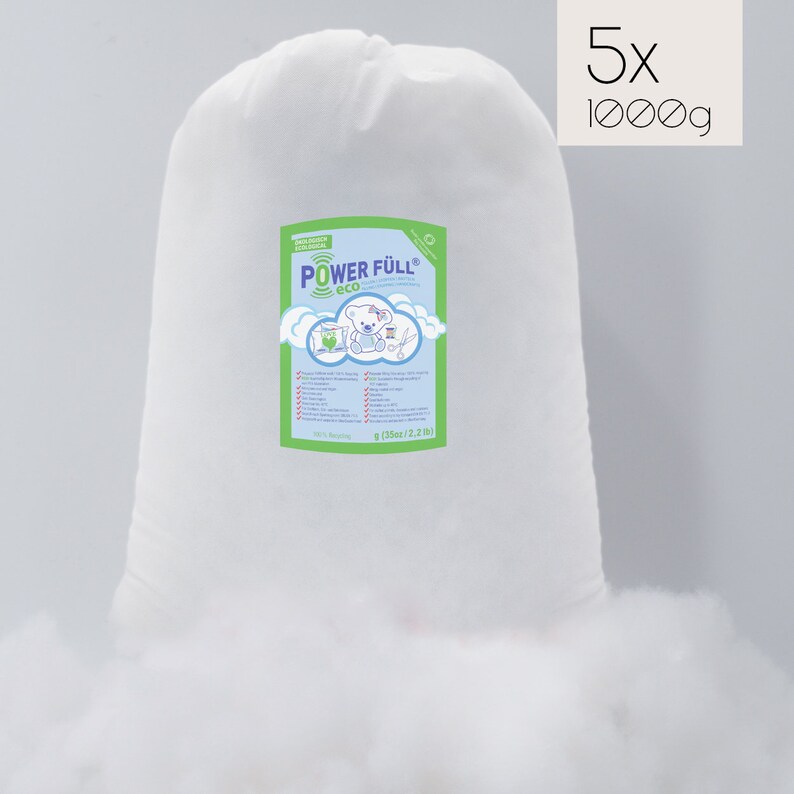 May include: Five bags of white polyester fiberfill, each bag containing 1000 grams of filling. The bags are labeled with the text "POWER FULL eco" and a cartoon bear.