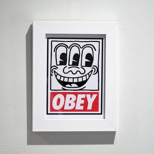 Obey Shepard Fairey x Keith Haring 3 Eyed Smiling Face A6 Postcard Street Urban Pop Art New