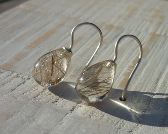 Rutilated quartz drops with silver as earrings