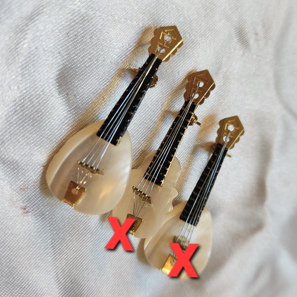 Pretty mother of pearl instrument pins