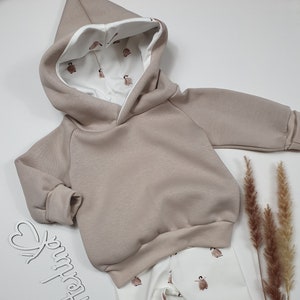 Hoodie “cuddly sweat sand/penguins”