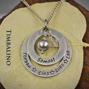 Handcrafted stainless steel pendant necklace with personalized engraving and birthstone