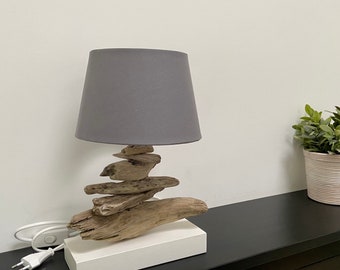 Handmade table lamp made of driftwood