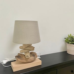 Handmade table lamp made of driftwood