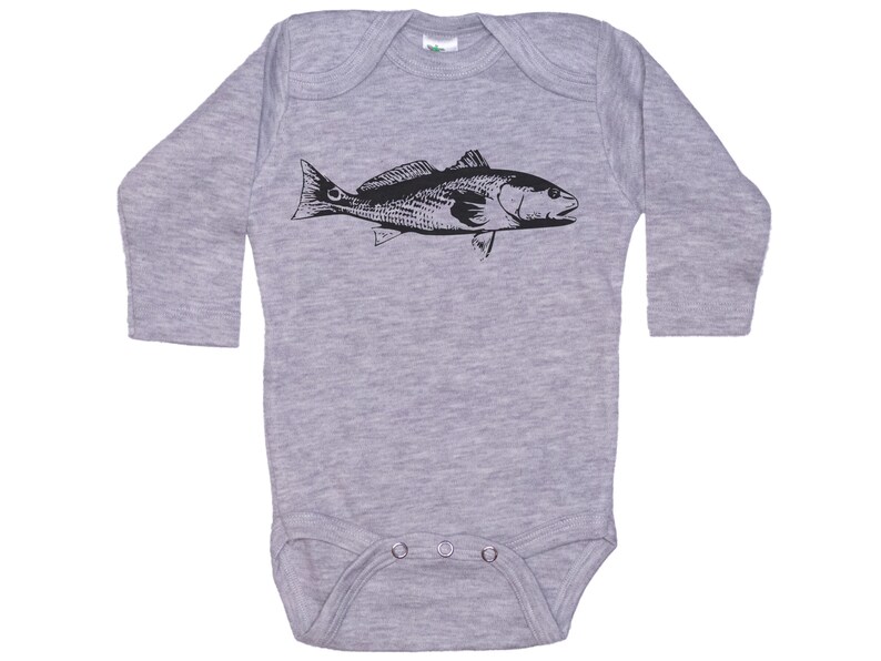 May include: A gray long-sleeve baby onesie with a black silhouette of a redfish on the front.