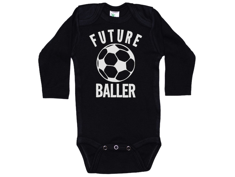 May include: Black long-sleeve baby bodysuit with white text that reads "FUTURE BALLER" and a white soccer ball graphic.