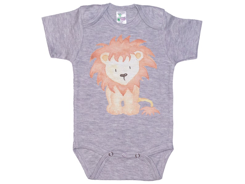 May include: A gray short-sleeved baby onesie with a watercolor illustration of a lion in orange and red.