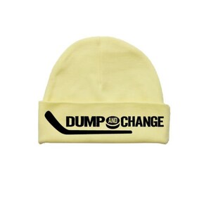 May include: A yellow beanie with a black hockey stick and puck graphic and the text "DUMP AND CHANGE".