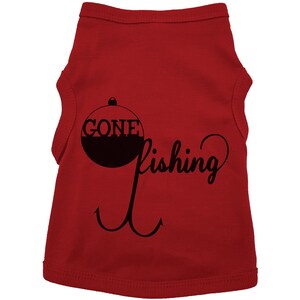 May include: Red sleeveless dog shirt with a black graphic of a fishing bobber with the word "GONE" on it and the word "fishing" written in a cursive font.  The graphic also includes a black fishing hook.