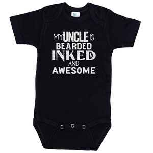 May include: Black baby onesie with white text that reads "My Uncle is Bearded Inked and Awesome".