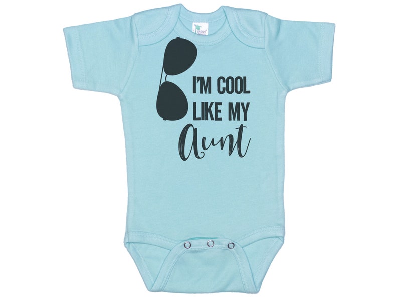May include: A light blue baby onesie with a black graphic of sunglasses and the text "I'm cool like my aunt".