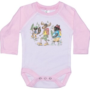 May include: Pink long-sleeve baby onesie with a white front featuring a cartoon illustration of a moose, a bear, and a raccoon wearing backpacks and hiking in the woods.