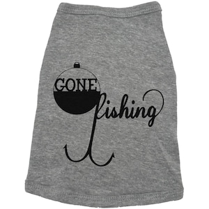 May include: Gray dog shirt with a black fishing bobber and hook graphic. The bobber says "Gone Fishing".