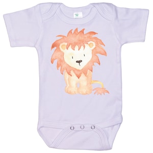 May include: A lavender baby onesie with a watercolor illustration of a lion with a red mane and a yellow body.