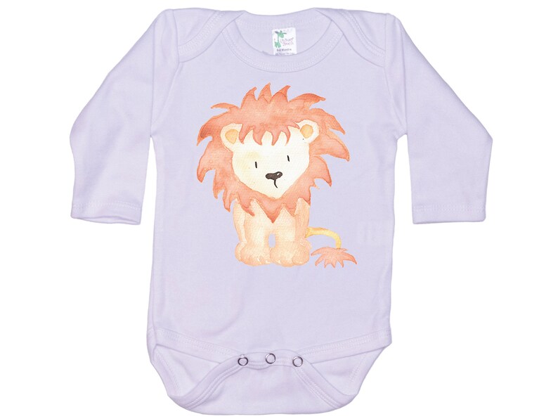 May include: A lavender long-sleeved baby onesie with a watercolor illustration of a cartoon lion with a brown mane and a yellow tail.