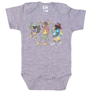 May include: A grey short-sleeved baby onesie with a graphic of a raccoon, moose, and bear wearing backpacks and hiking in the woods.