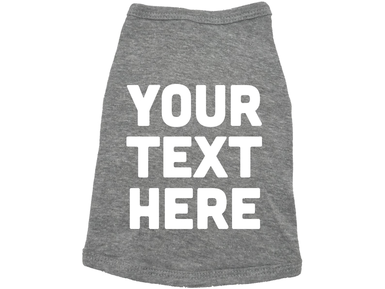 Op de afbeelding: Grijs honden T-shirt met witte tekst die "YOUR TEXT HERE" zegt.