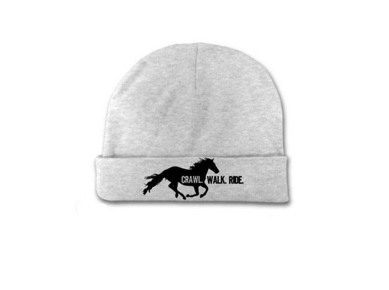May include: Gray beanie with a black silhouette of a running horse and the text "CRAWL. WALK. RIDE."