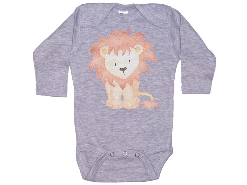 May include: A gray long-sleeved baby onesie with a watercolor illustration of a brown and orange lion with a red mane.