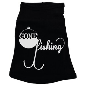May include: Black dog t-shirt with a white graphic of a fishing bobber with the word "GONE" inside and the word "fishing" written in a cursive font below the bobber.  Two white fishing hooks are below the word "fishing".
