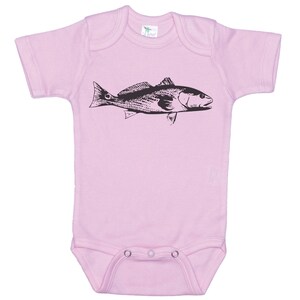 May include: A pink baby onesie with a black and white illustration of a fish.