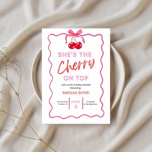 May include: A baby shower invitation with a pink scalloped border and cherry graphic. The text reads "She's the Cherry on Top" with details for Melissa Smith's baby shower, including the date, June 2nd, and time, 2 o'clock in the afternoon.