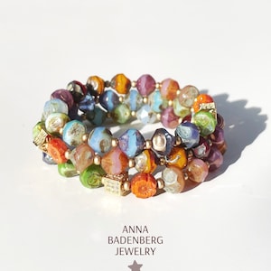 BRACELET made of Bohemian cut glass beads in warm rainbow colors and a spacer made of 925 sterling silver, 24Kt gold plated with zirconia