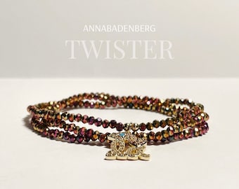 BRACELET made of glass beads in the color gold magenta and a gold-plated charm with zirconia, pendant wrap bracelet