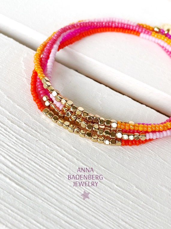 GLASS BEAD BRACELET 2 MM ORANGE & PINK GLASS BEAD BRACELET 2 MM ORANGE & PINK