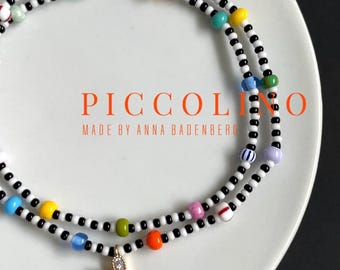 PULSERA Preciosa con cuentas de cristal en blanco y negro y cuentas de semillas de colores de 4 mm, separadores y dije de corazón. Pulsera envolvente de plata de ley chapada en oro de 24 quilates.