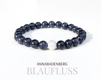 ARMBAND aus funkelndem, dunkelblauen Blaufluss (8 mm) und einem Spacer aus 925er Sterling Silber, diamantiert