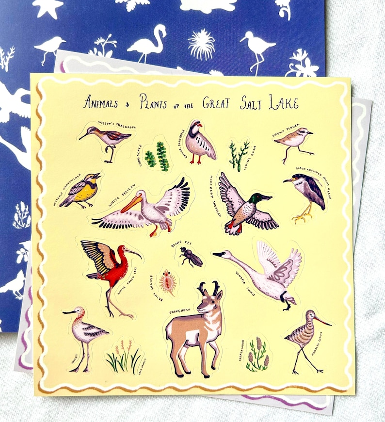 May include: A sticker sheet with illustrations of Great Salt Lake animals and plants. The stickers depict birds, insects, and a pronghorn, on a yellow background with a scalloped edge. The text "Animals & Plants of the Great Salt Lake" is displayed at the top of the sheet.