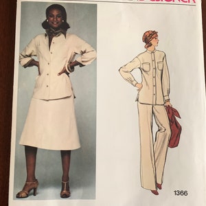 May include: Vogue American Designer sewing pattern number 1366 by Calvin Klein. The pattern features a white shirt and pants or skirt.