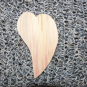 Beautiful heart and heart made of wood. image 2