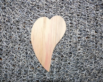 Beautiful heart and heart made of wood.