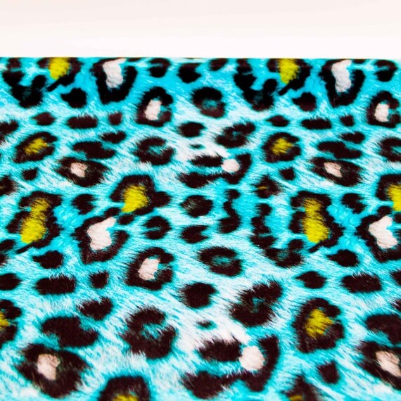 Leo Polstervelour türkis schwarz Fellimitat Leopard Muster samtig weicher  Velourstoff türkis schwarz mit Leoprint - Main Image