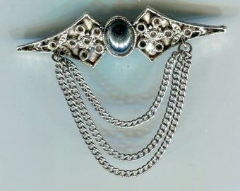 filigree medieval Renaissance brooch with cabochon and cascade silver and hematite look