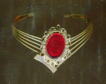 Medieval Renaissance cuff with cabochon in ruby look