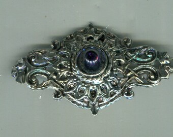 Medieval Renaissance brooch with cabochon in montana blue 50 x 28 mm