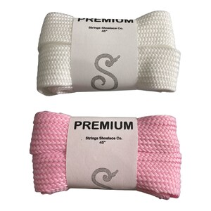 May include: Two pairs of shoelaces, one white and one pink, both 45 inches long. The shoelaces are made by Strings Shoelace Co. and are labeled "PREMIUM".