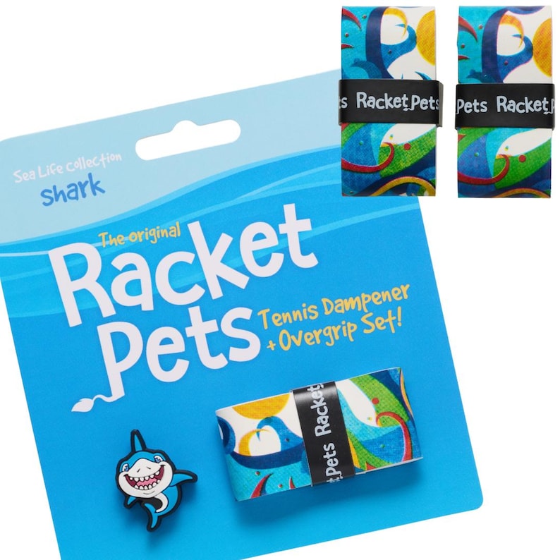 May include: A blue and white package featuring "Racket Pets" tennis accessories. The package includes a shark-shaped dampener and overgrip set. The overgrip set has a colorful design with sharks and the text "Racket Pets".