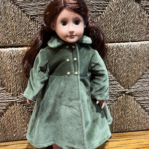 Green coat, green dress, green shirt, green striped pants and greenish brown scarf for 18 inch doll