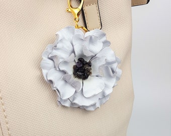Encanto genuino bolso de flores de cuero, colgante de bolso, llavero de flores.