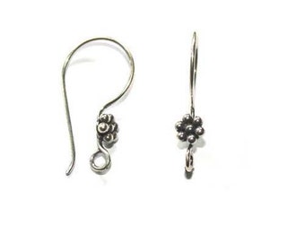 925 Sterling Silver earrings with an antique flower