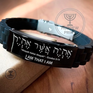 May include: Black silicone bracelet with a silver metal plate engraved with Hebrew text and the words "Ahayah Asher Ahayah" - Exodus 3:14, "I AM THAT I AM".