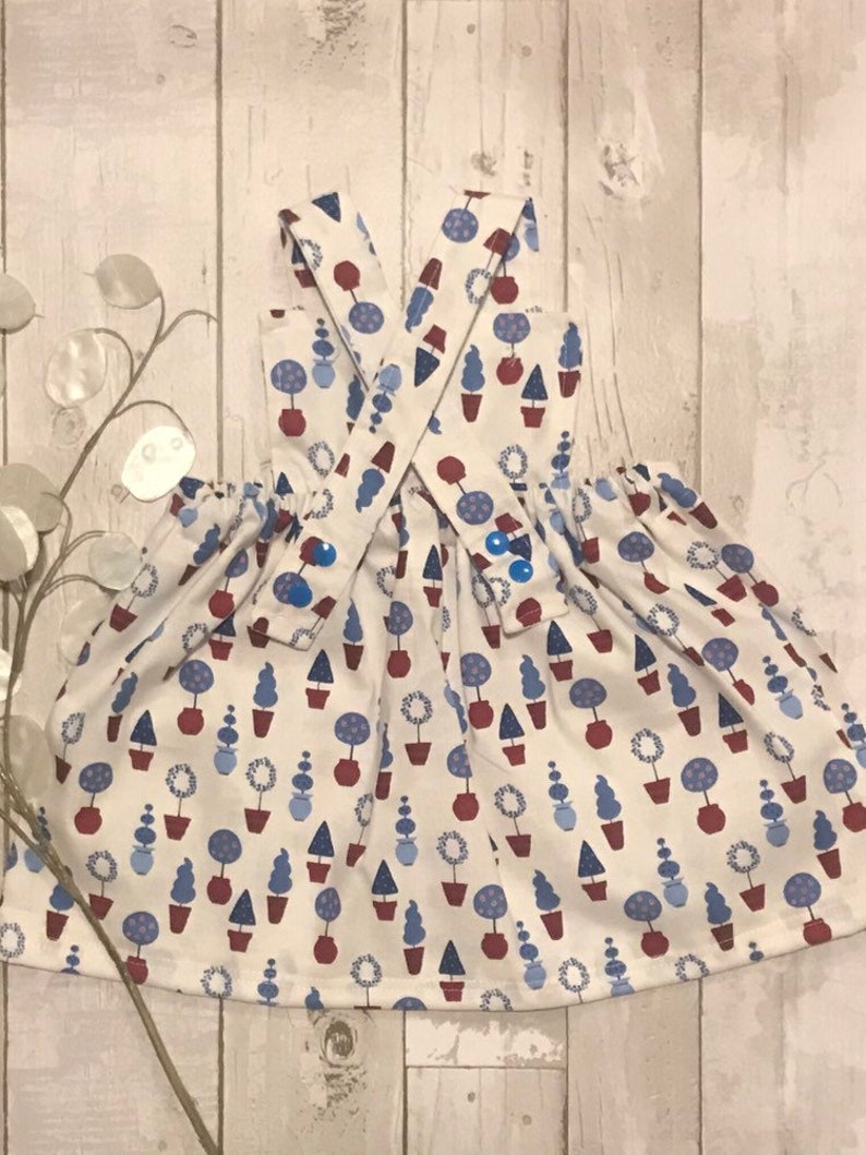 Topiary Pinafore 6-9 months