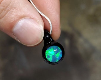 Hand Blown Opal Pendant Encased in Borosilicate Glass with Silver Chain Necklace (Multicolored Opal Coin - Galaxy Black Sparkle Backing)