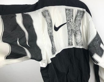 Vintage 90s Nike Embroidered Logo Full Zip Nylon Windbreaker Vintage 90s Nike Embroidered Logo Full Zip Nylon Windbreaker