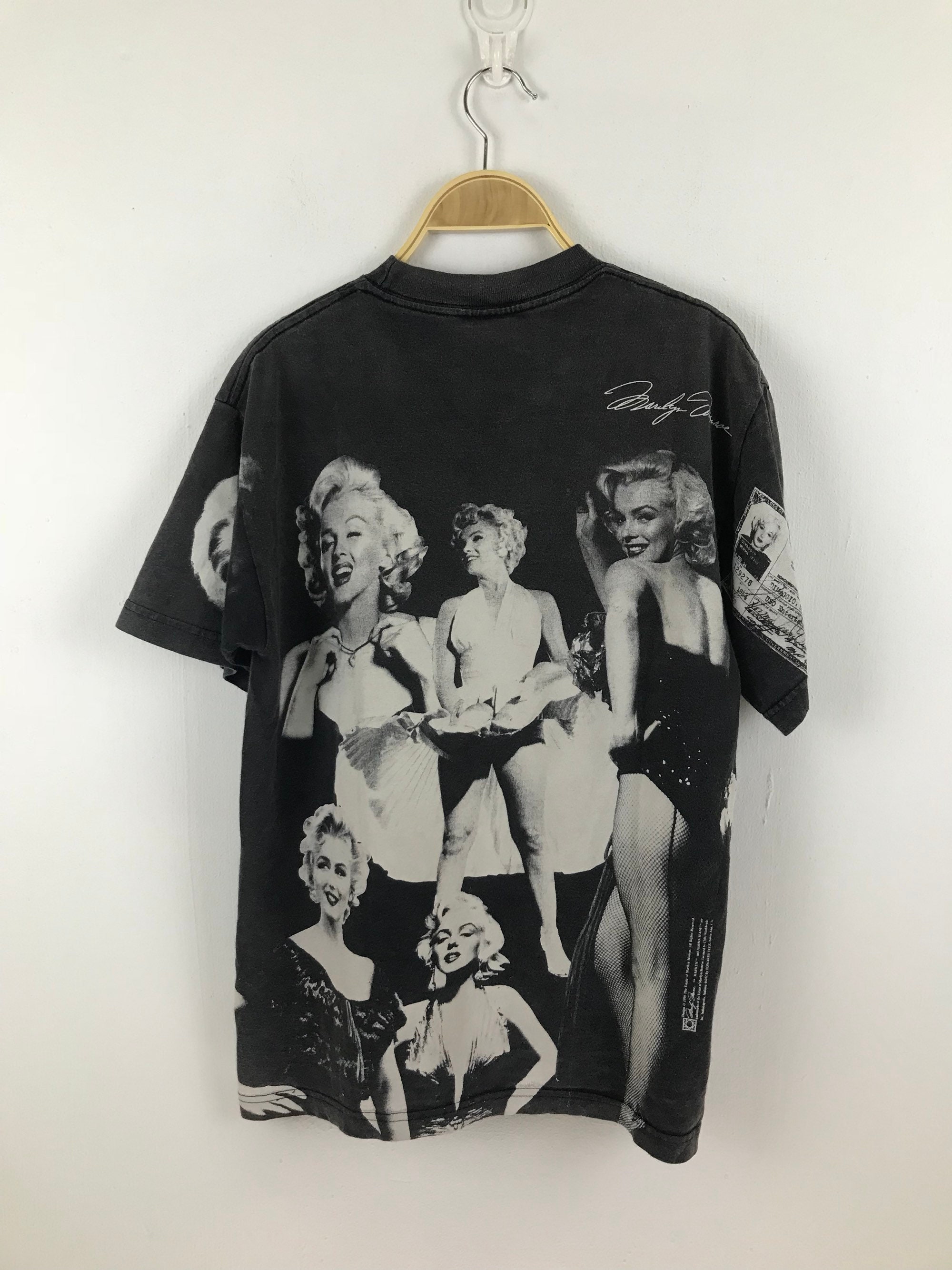 Ameri（アメリ）の「SHADOW MANY MARILYN MONROE TOP（Tシャツ